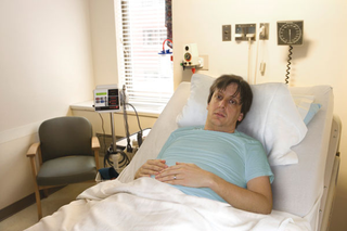 Kaplan ponders his loss from the bed of his Burbank hospice.